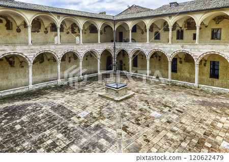 Courtyard of the friary of Saint Francis Church, Assisi, Italy Courtyard of the friary of Saint Francis Church, Assisi, Italy 120622479