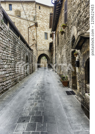 Scenic streets of the medieval town of Assisi, Umbria, Italy 120622483