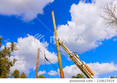 Several electric poles have been damaged by storms following severe hurricane 120625919
