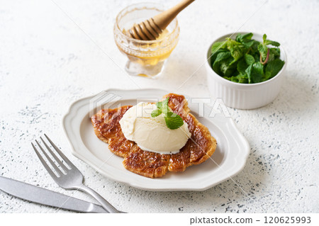 Kurunji topped with vanilla ice cream Kurunji topped with vanilla ice cream 120625993