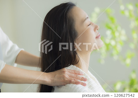 Young woman relaxation salon image 120627542