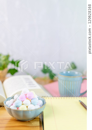 Coffee and a mountain of Ramune are prepared along with study materials. Coffee and a mountain of Ramune are prepared along with study materials. 120628168
