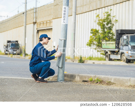 Investigators inspecting the accident scene 120628508