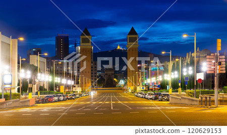 Barcelona cityscape in twilight wth Avinguda de la Reina Maria Cristina 120629153
