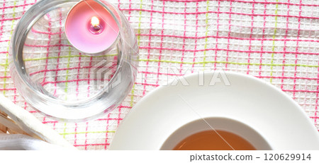 Winter self-care: Aromatherapy candles, aroma oils, moisturizing cream, and delicious herbal tea 120629914