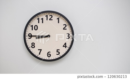 Classic Black-Edged Clock on White Background at 20.45/08.45 - Perfect for Time Management and Text Space 120630213