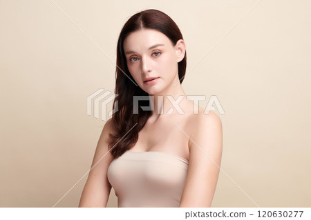 Beautiful young woman with clean fresh skin on beige background, Face care, Facial treatment, Cosmetology, beauty and spa, women portrait. 120630277