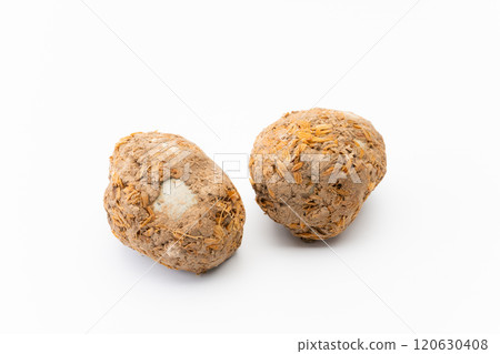 Century egg wrapped in clay 120630408