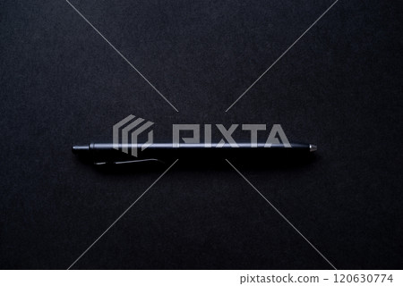 Black ballpoint pen on a black background 120630774