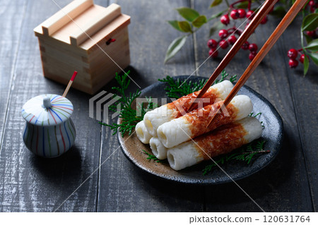 Traditional Taste: Grilled Chikuwa (Dark Background) Traditional Taste: Grilled Chikuwa (Dark Background) 120631764