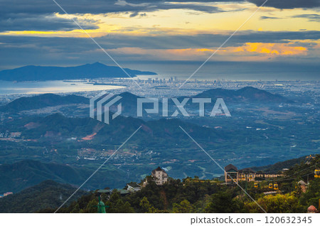 Top view of Da Nang city in Vietnam from mountain in Ba Na Hills at sunset 120632345