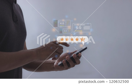 Review Excellence, Young Man hand holding Smart Phone with five star to review and give 5 stars Review Excellence, Young Man hand holding Smart Phone with five star to review and give 5 stars 120632500
