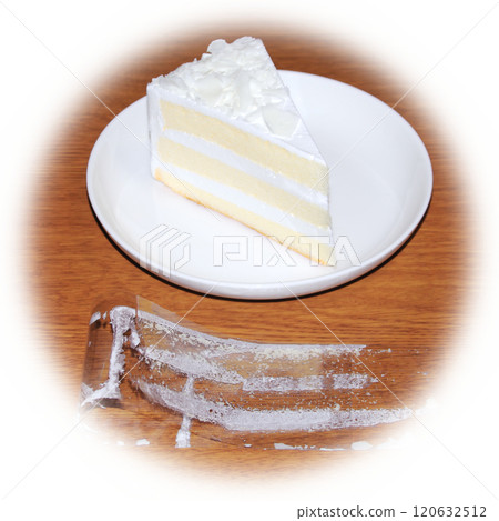 The film is peeled off the shortcake, folded, and placed on a wooden table, with white cream still stuck to the inside. The film is peeled off the shortcake, folded, and placed on a wooden table, with white cream still stuck to the inside. 120632512