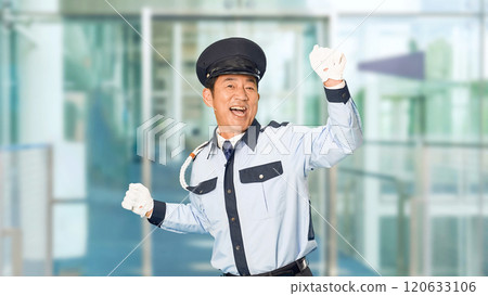 Male security guard dancing at the building entrance Male security guard dancing at the building entrance 120633106