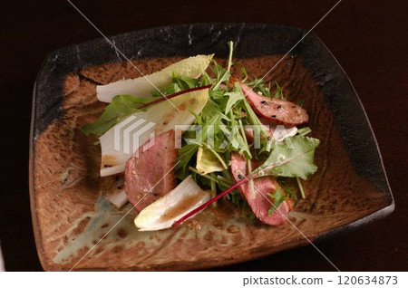 Duck loin salad 120634873