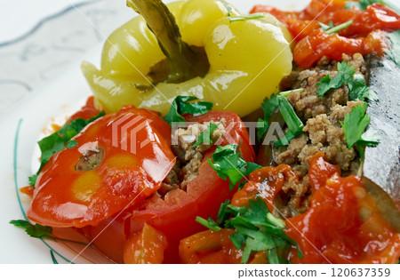 Stuffed aubergines, peppers and tomatoes 120637359