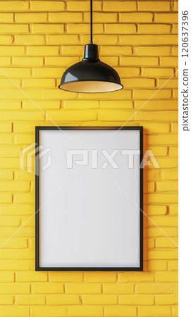 Framed white poster on yellow brick wall with industrial lamp 120637396