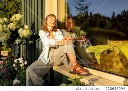 Relaxing by the Window in a Sunlit Garden Relaxing by the Window in a Sunlit Garden 120638904