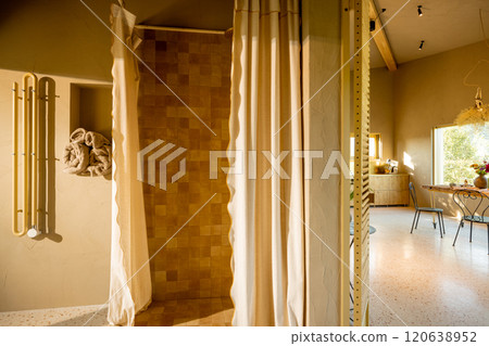 Cozy Shower Area with Warm Tones Cozy Shower Area with Warm Tones 120638952