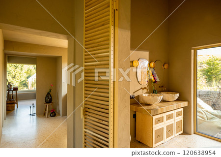 Sunlit Bathroom with Natural Touches 120638954