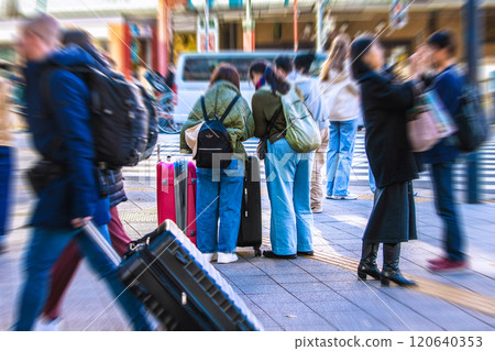 Tokyo cityscape in Japan in November. Inbound tourism continues... Tourists with suitcases are gathering in front of Asakusa Station and at Azumabashi intersection... 120640353