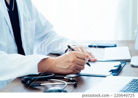 Doctor taking notes Doctor taking notes 120640725