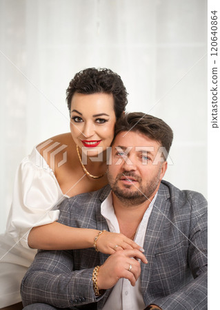 A man and woman smiling 120640864