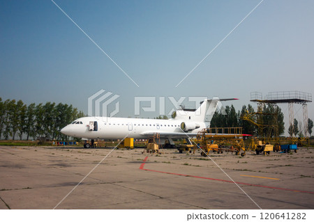 Repair and maintenance of passenger airplane on the aviation technical base 120641282