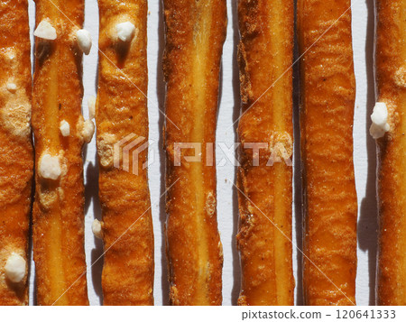 salted sticks snacks baked food background 120641333