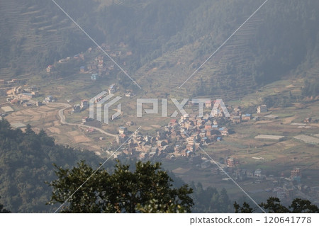 A view of the mountain town, fields and roads of Kathmandu, Nepal, seen from the top of a mountain A view of the mountain town, fields and roads of Kathmandu, Nepal, seen from the top of a mountain 120641778