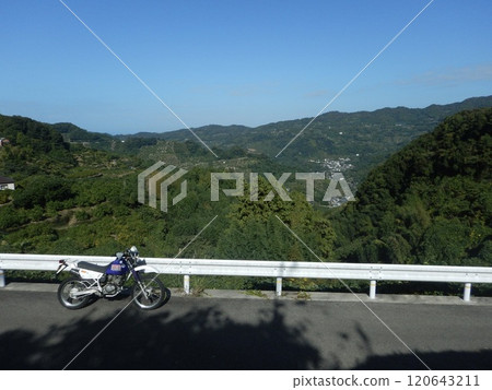 Motorcycle with mountain background Motorcycle with mountain background 120643211