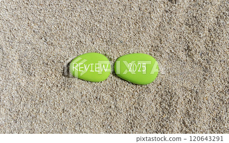 Planning review 2025 new year symbol. Concept words Review 2025 on beautiful green stones. Beautiful sand sea beach background. Business review 2025 new year concept. Copy space. Planning review 2025 new year symbol. Concept words Review 2025 on beautiful green stones. Beautiful sand sea beach background. Business review 2025 new year concept. Copy space. 120643291