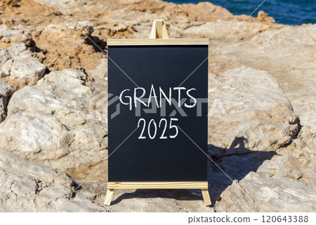 Planning grants 2025 new year symbol. Concept words Grants 2025 on beautiful yellow chalk blackboard. Beautiful stone beach blue sky background. Business grants 2025 new year concept. Copy space. Planning grants 2025 new year symbol. Concept words Grants 2025 on beautiful yellow chalk blackboard. Beautiful stone beach blue sky background. Business grants 2025 new year concept. Copy space. 120643388