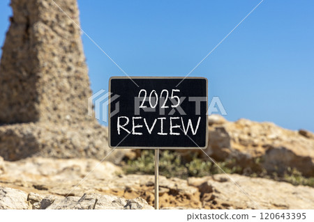 Planning 2025 review new year symbol. Concept words 2025 Review on beautiful yellow chalk blackboard. Beautiful stone beach blue sky background. Business 2025 review new year concept. Copy space. Planning 2025 review new year symbol. Concept words 2025 Review on beautiful yellow chalk blackboard. Beautiful stone beach blue sky background. Business 2025 review new year concept. Copy space. 120643395