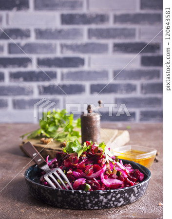 Vinegret- traditional Russian beet salad and vegetables on plate 120643581