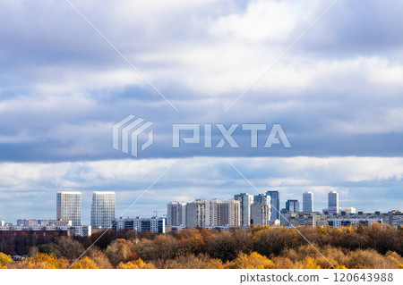low dark blue cloudy sky over colorful city park low dark blue cloudy sky over colorful city park 120643988