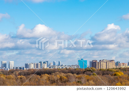 blue sky with low clouds over city park in autumn 120643992