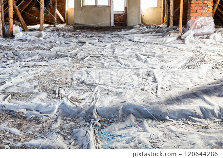 attic floors covered with polyethylene film attic floors covered with polyethylene film 120644286
