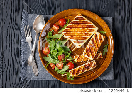 Grilled Greek Halloumi Cheese on sticks, top view 120644648