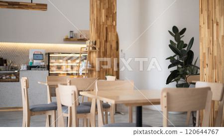 Coffee shops with tables are empty by noon. 120644767