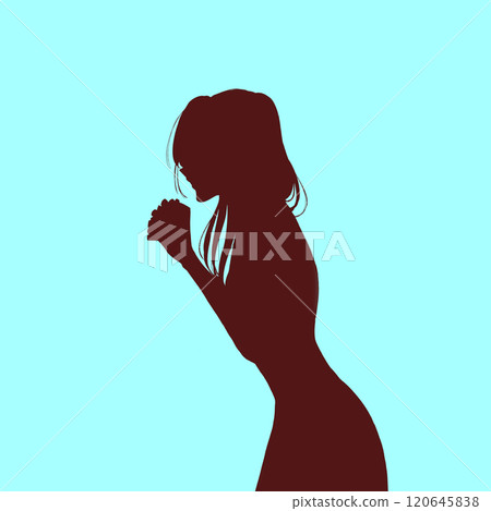 Praying woman silhouette 120645838