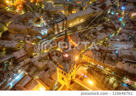 Aerial night View of Tallinn in winter, roofs are covered with snow, Christmas mood Aerial night View of Tallinn in winter, roofs are covered with snow, Christmas mood 120646761