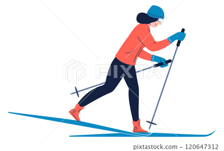 A woman is skiing down a slope with her skis on 120647312