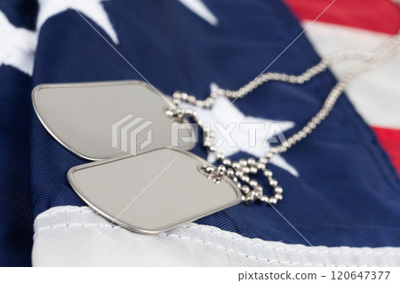 US army dog tags on USA national flag 120647377