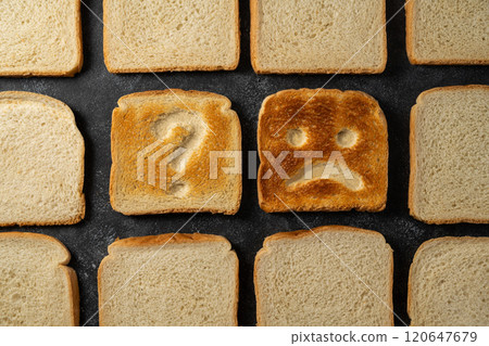 Gluten food, celiac disease, slice of toasted bread with sad face and question sign. Gluten sensitivty 120647679