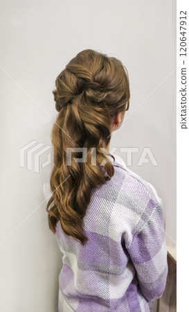 Long hair. Hairstyle in a beauty salon. Salon work. Perm 120647912