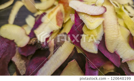 Vegetable peelings on a wooden board. Cooking borscht. Zero waste concept. Vegetable peelings on a wooden board. Cooking borscht. Zero waste concept. 120648199