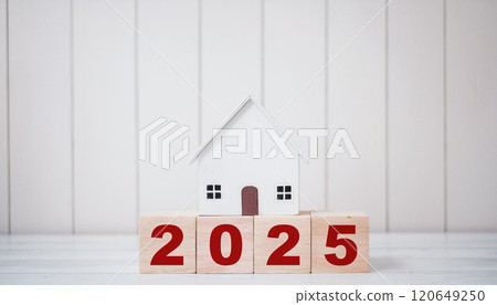 White Wooden House on 2025 Wooden Block Numbers for Minimalist New Year Real Estate Concept White Wooden House on 2025 Wooden Block Numbers for Minimalist New Year Real Estate Concept 120649250
