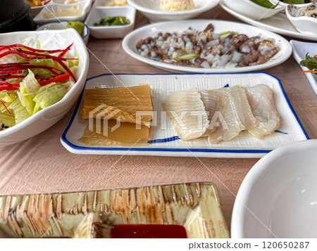 Korean food. Skate sashimi and white kimchi Korean food. Skate sashimi and white kimchi 120650287