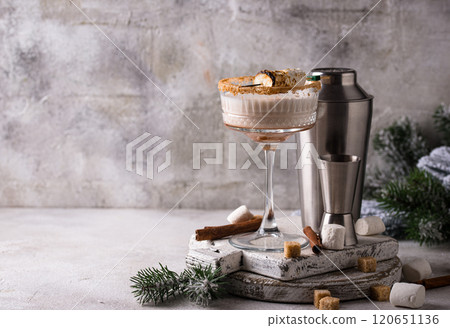 Christmas cocktail with toasted marshmellow Christmas cocktail with toasted marshmellow 120651136